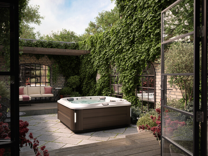 hot tub enclosure - hot tub in private garden with vine covered stone walls